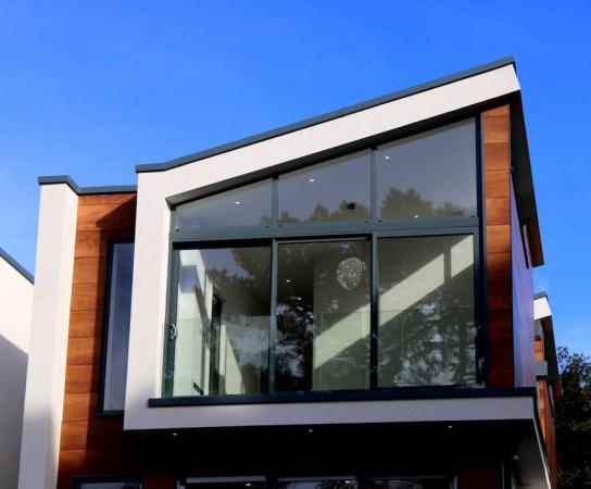 قیمت مدل های متنوع نمای شیشه ای ساختمان مسکونی